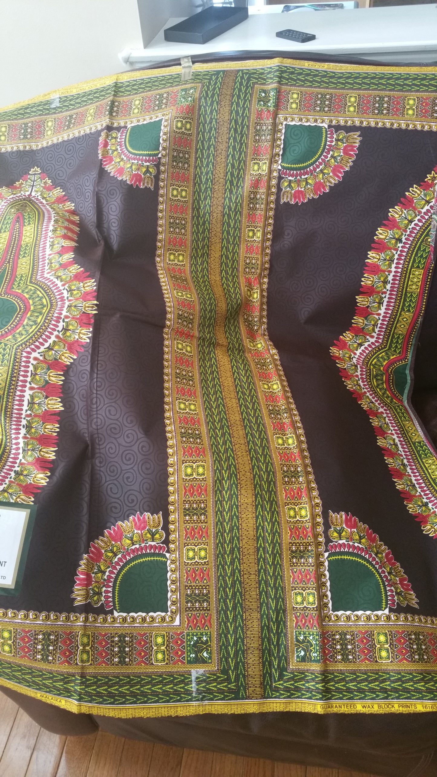 Latest Dashiki African Ankara Wax print fabric. 100% cotton chocolate brown. Sold per 6yds, price is for 6yds.