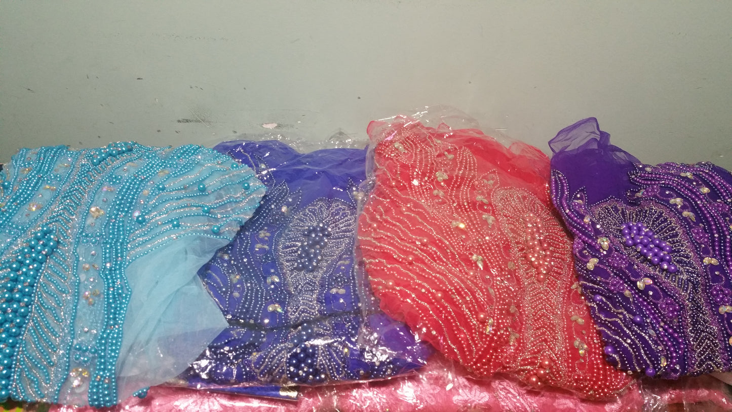 Beaded and stoned net for making Blouses for George wrapper. Sold in 1.8yards lenght. Available in 4 colors