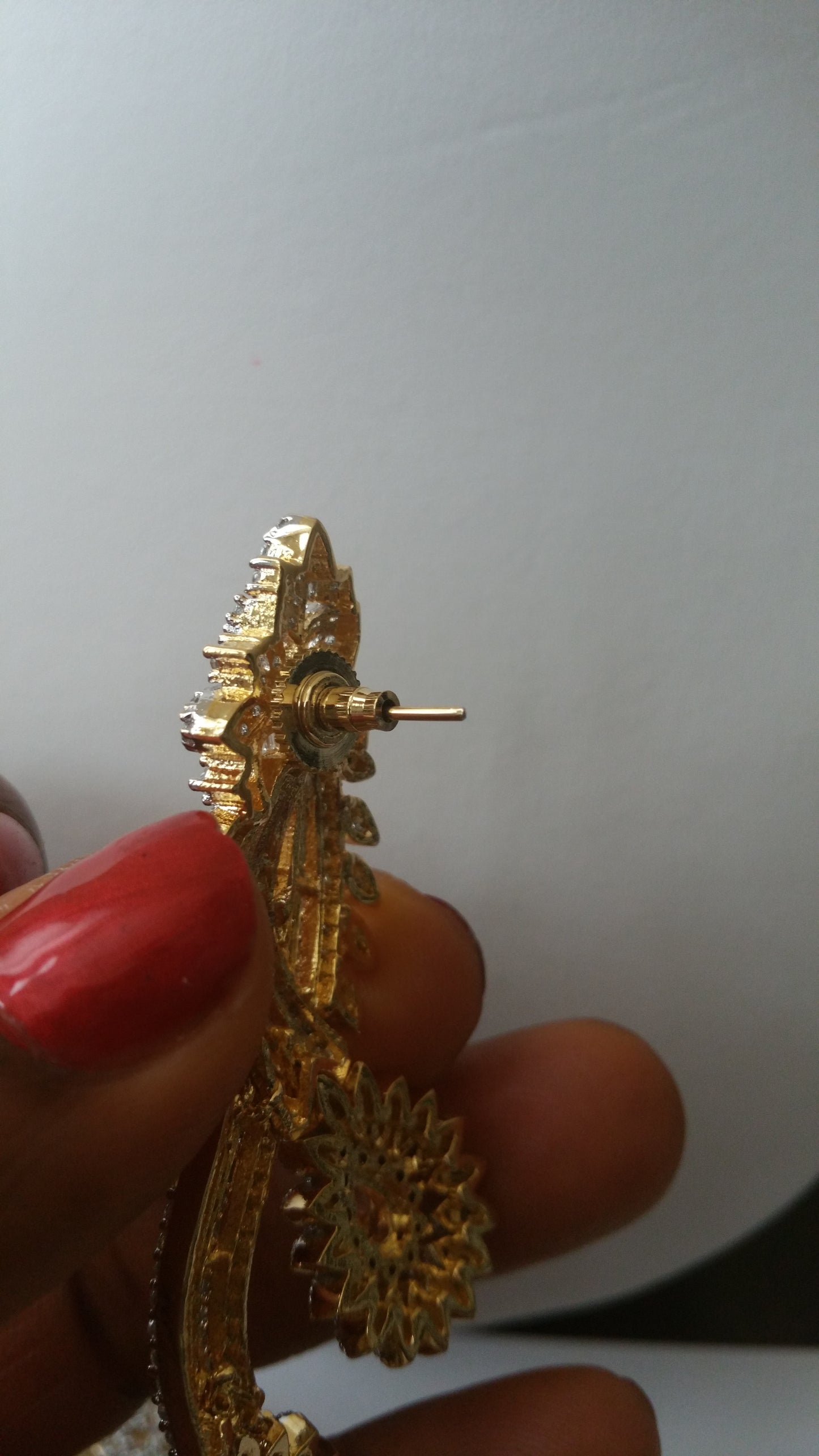 22k electroplated America Diamond-earings. Hand set with quality dazzling CZ stones. Original quality, hypoallergenic. Light weight drop-earrings