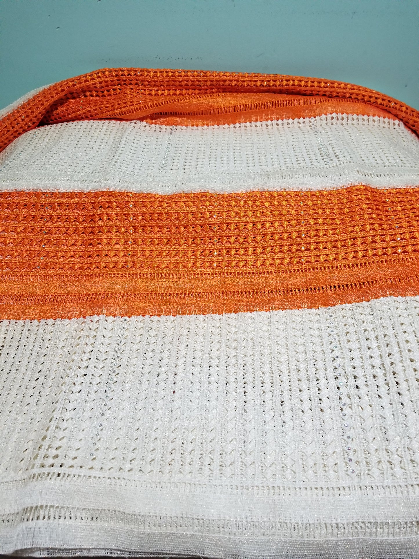 Clearance: Cream/Orange Cord-lace fabric for makimg Nigerian party dress. Sold per 5yds. Price is for 5 yds. Beautiful guipure-lace with stones
