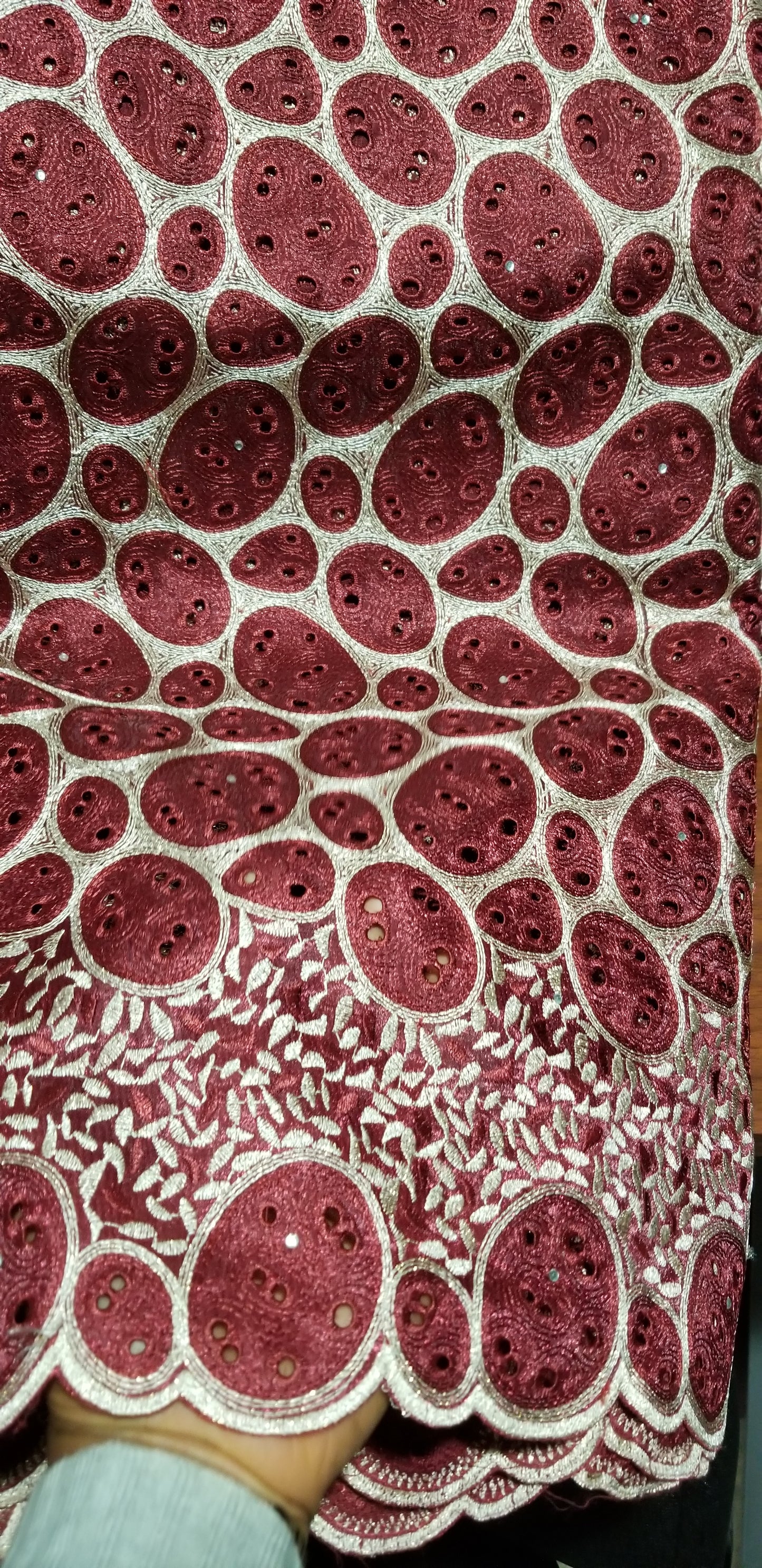 Clearance: Organza Wine/Gold swiss Lace fabric. Lustrous Nigerian fabric for making Native dress for big ceremonies. Quality embriodery work. Sold per 5yds
