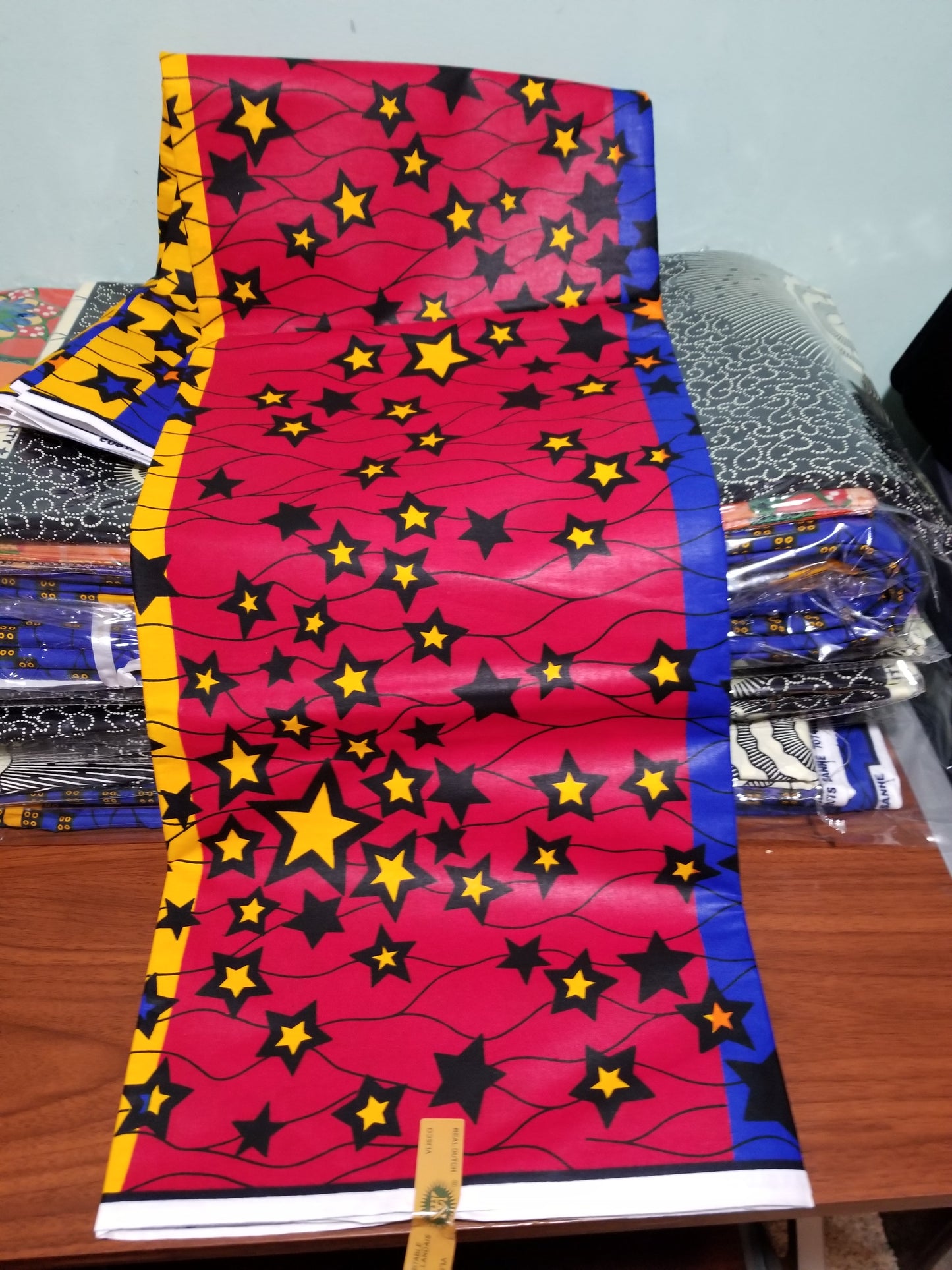 3 color Nigerian Gaurantee wax print yellow star in 3 tone colors red/royal/yellow. African ankara wax print fabric sold per 6yds. 100% cotton. Hitarget