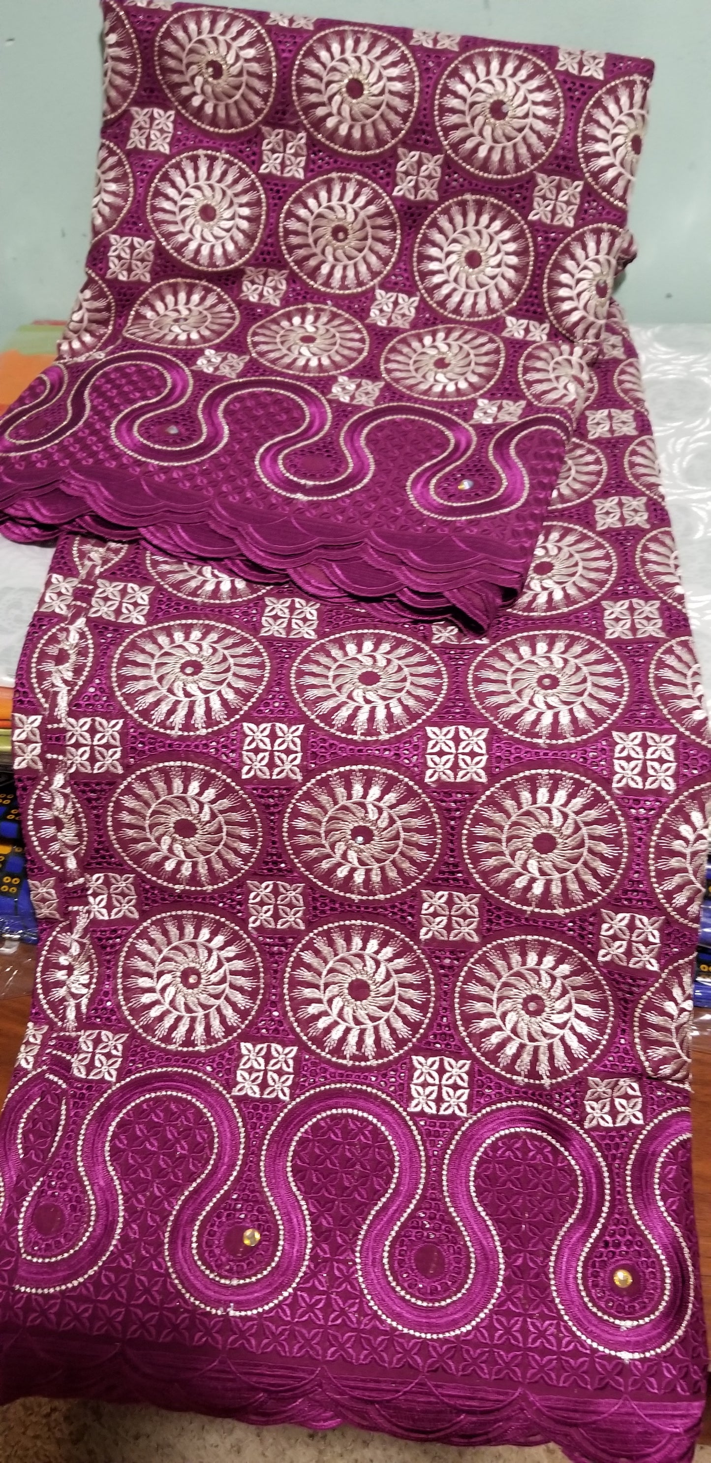 Exclusive swiss lace fabric in magenta color. Nigerian traditional celebrant Swiss lace embroidered with quality, soft beautiful design. Sold per 5yds