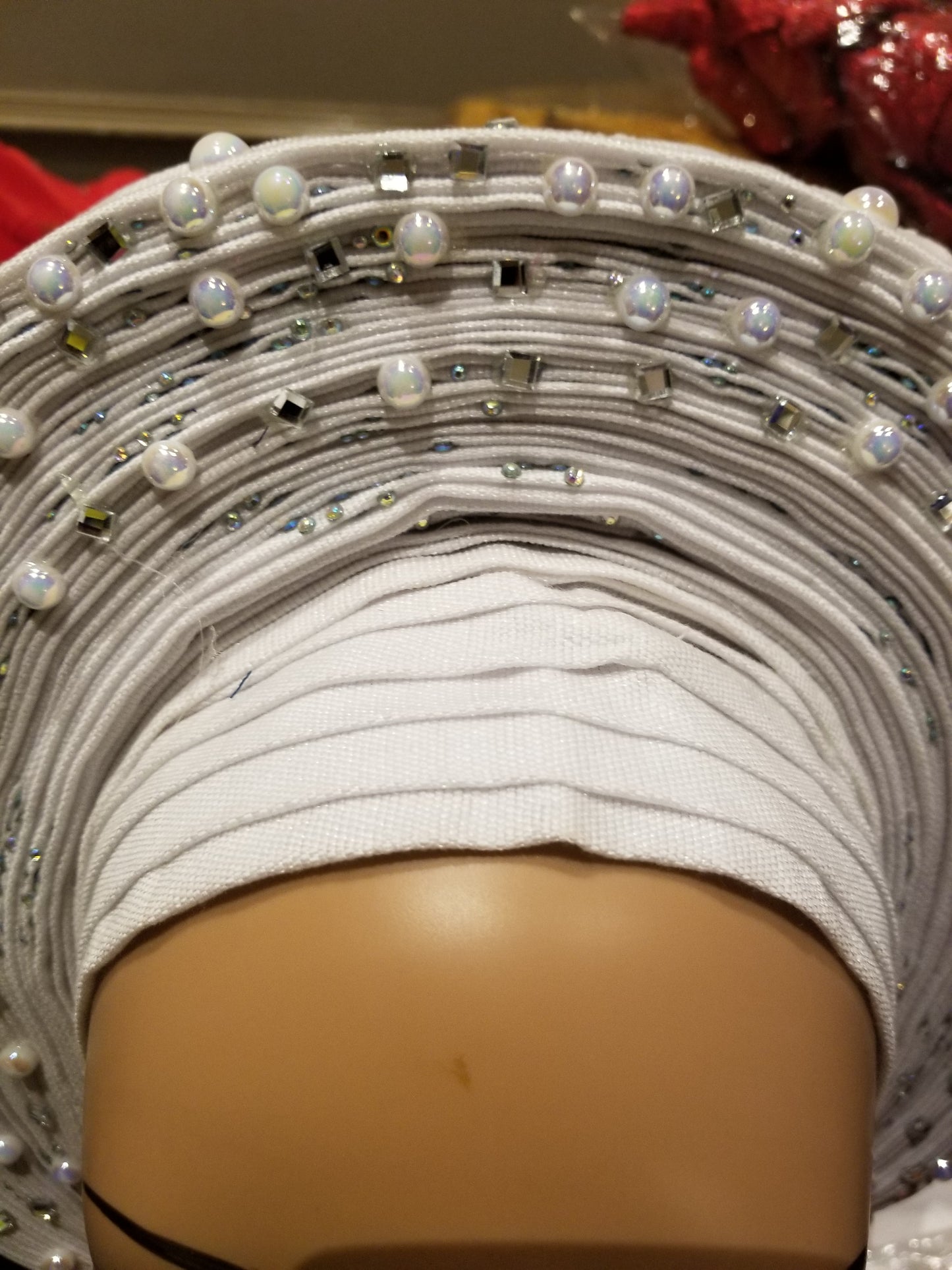 Pure white Auto-gele. Nigerian aso-oke made into auto gele. beaded and stoned to perfection. Party ready in less than 5 minutes. One size fit, easy adjustment at the back. Made with quality aso-oke. Big design with white beads and stones