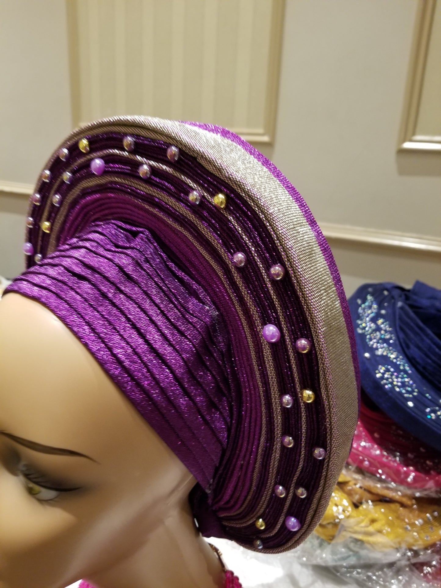 Purple/silver Auto-gele made with quality Aso-oke. Beaded and stoned quality hand work. One size fit, easy to adjust for fit and knot at the back