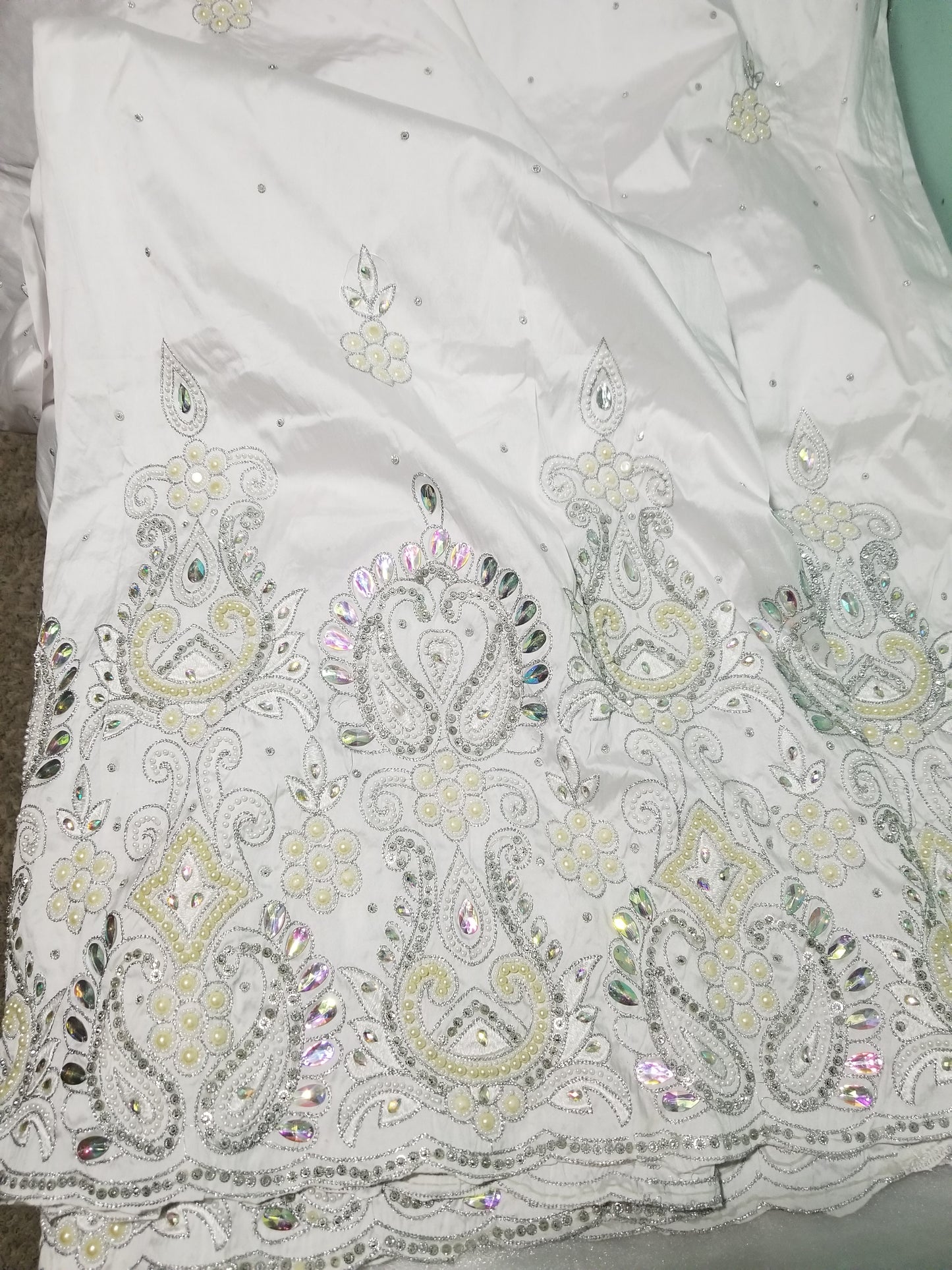 Price drop!! Pure White/White hand stoned Silk George wrapper. Nigerian Bride beautiful in White George wrapper. Sold as a set of 2 wrapper + 1.8yds Net for blouse. Niger/delta/Igbo traditional bridal outfit. Quality stone work to perfection?