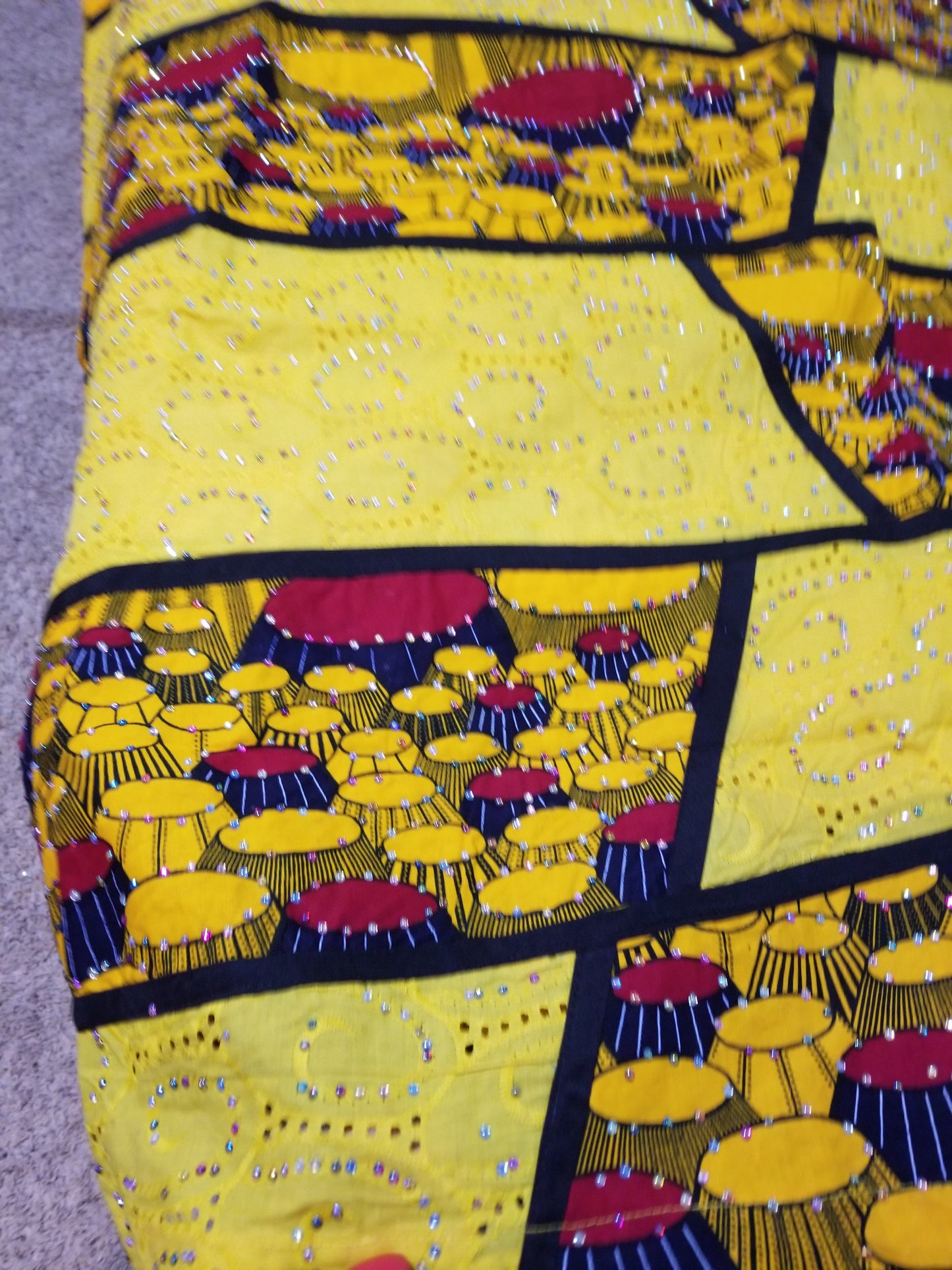 clearance:. Embriodered and stoned Ankara-dress, Long dress embellished with shinning multi color Swarovski stones to perfection! Fit Burst 48" and Full lenght 59", sleeve lenght 19.5. Made with Quality hitarget Ankara mix with dry lace. Flared sleeves