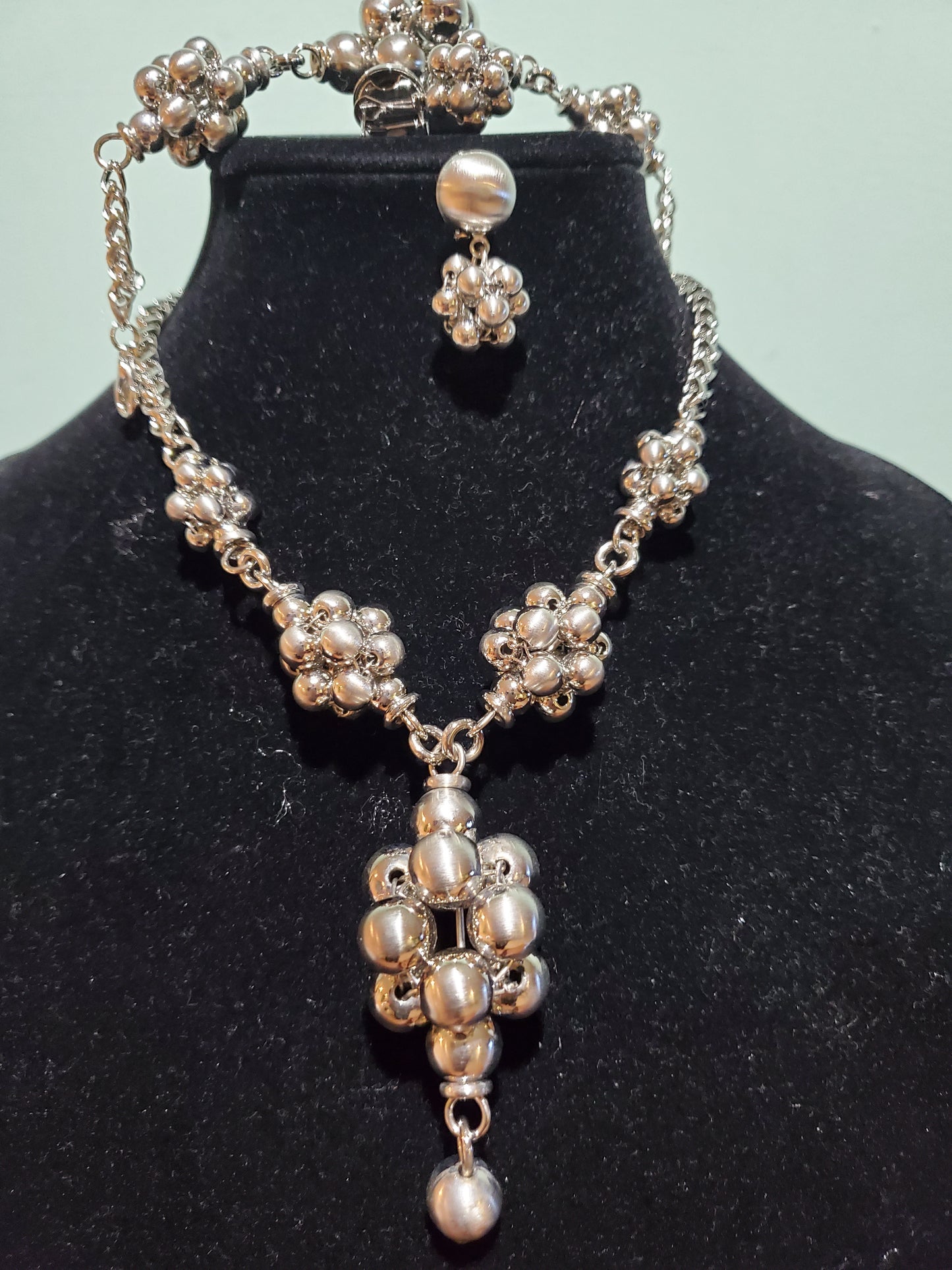 silver plated high quality 3pcs necklace set. Jewelry set for church and party wear. Cluster bead Necklace, earrings, & bracelet. High quality & hypoallergenic plating. Open ring for easy adjustment