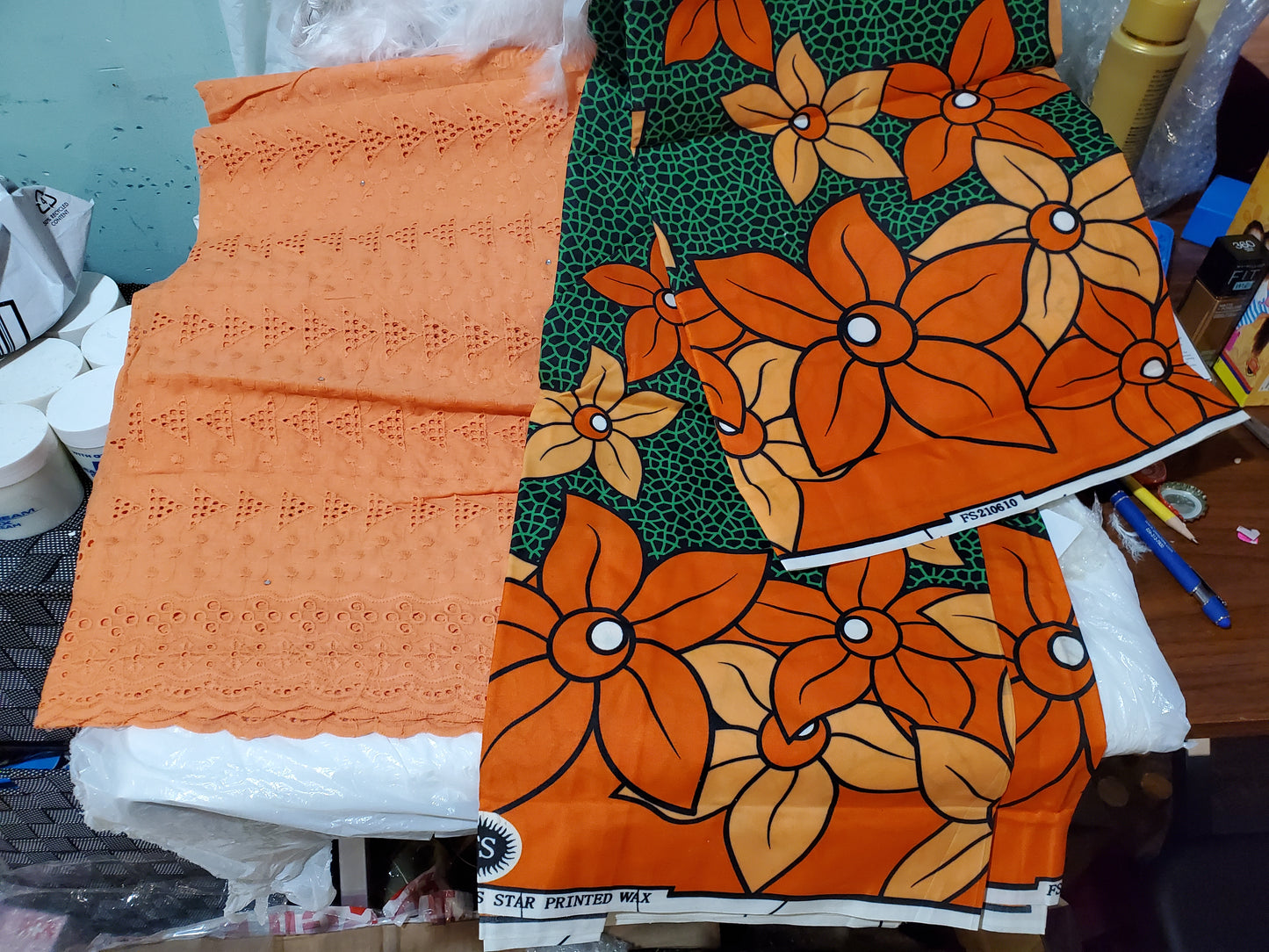 New African wax print- green Ankara + peach lace combination pack. 3yard ankara and 2 yards dry lace in a pack. Luxuriouse quality ankara. Veritable wax print