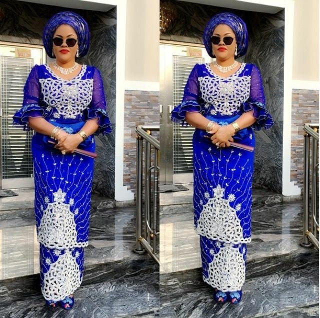 Currently out of stock. Can Make per order. Royal blue VIP hand beaded and stoned Silk George wrapper. Classic color for Nigerian Traditional wedding Outfit. Sold as 5yds + 1.8uds matching net blouse. Allow 4 weeks