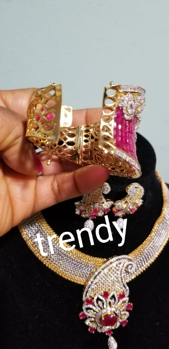 Combo sale 3pc 22k Electroplating Dubai costume jewelry set. High Quality Imitation GOLD set with pink and silver Dazzling CZ stones. Bangle, necklace and earrings