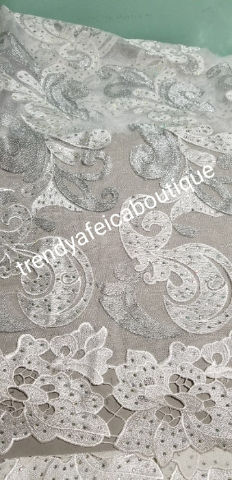 CLEARANCE ITEM: white French lace fabric with silver lurex and all over crystal stone work. Sold 5yards length