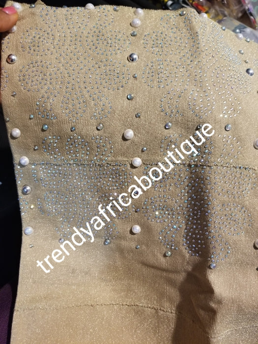 Champagne Gold/ aso-oke gele. Beaddazzled with silver crystal border. Original quality from Nigeria beaddazzled border for a more creative head wrap