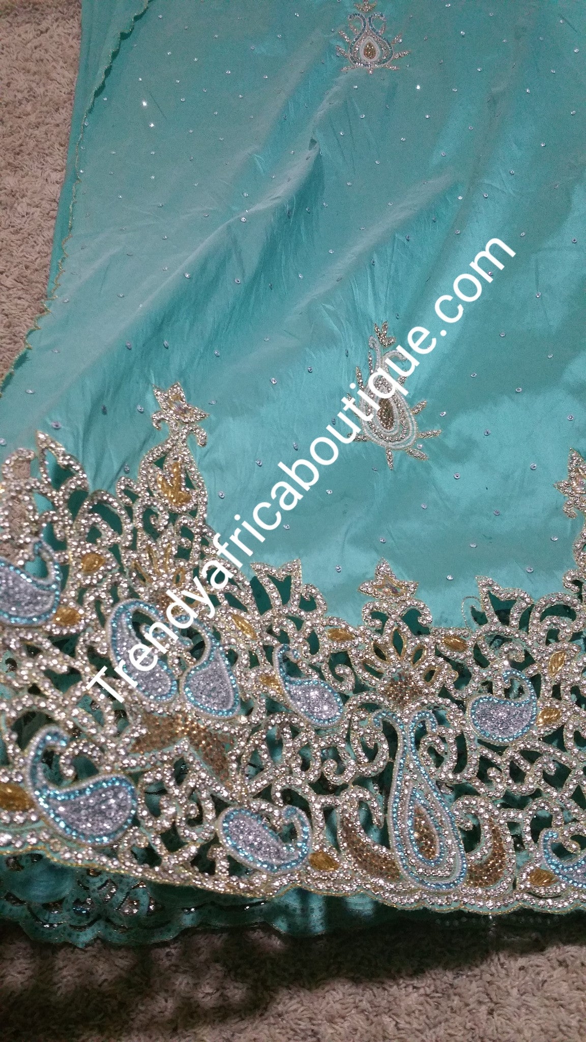 Aqua blue heavily hand Stoned Igbo/Nigerian women Celebrant George wrapper. 5 yards length. All over hand stones with hand cutwork stone border