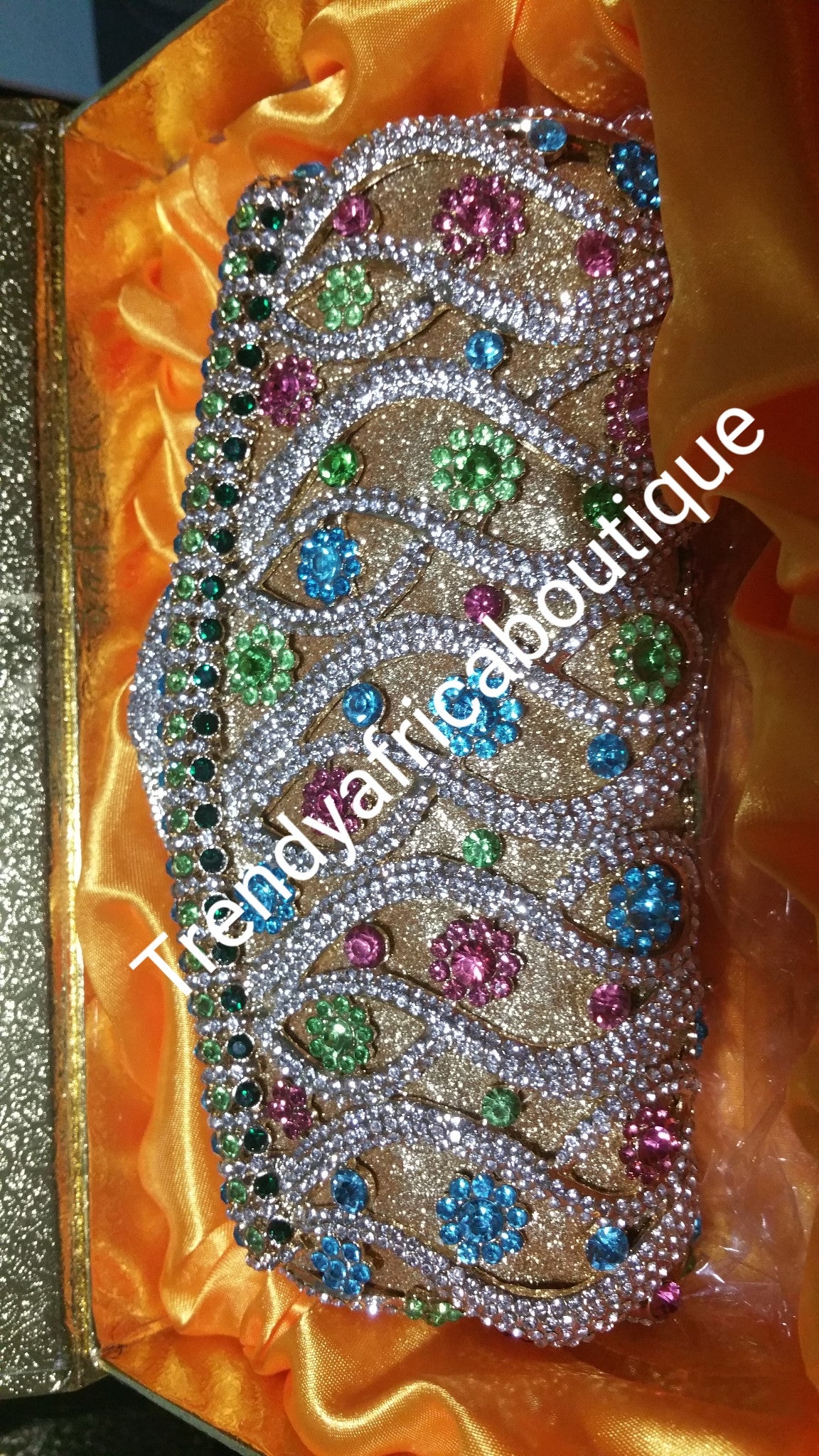 Clearance: Quality evening hand clutch. Crystal Clutch/purse. 8" long x 5" wide. All over dazzling crystal stones. Multi color stones
