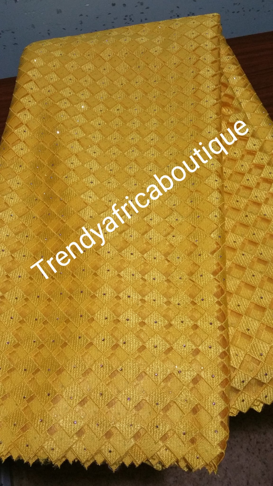 Clearance: African French lace fabric in verbrant yellow. All over crystals stones. Sold per 5 yards.