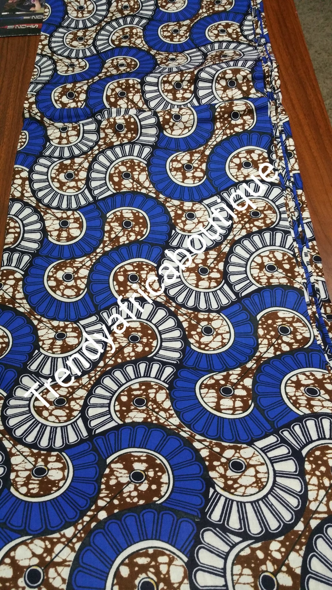 Original quality African cotton wax print fabric. Sold per 6yrds lenght.