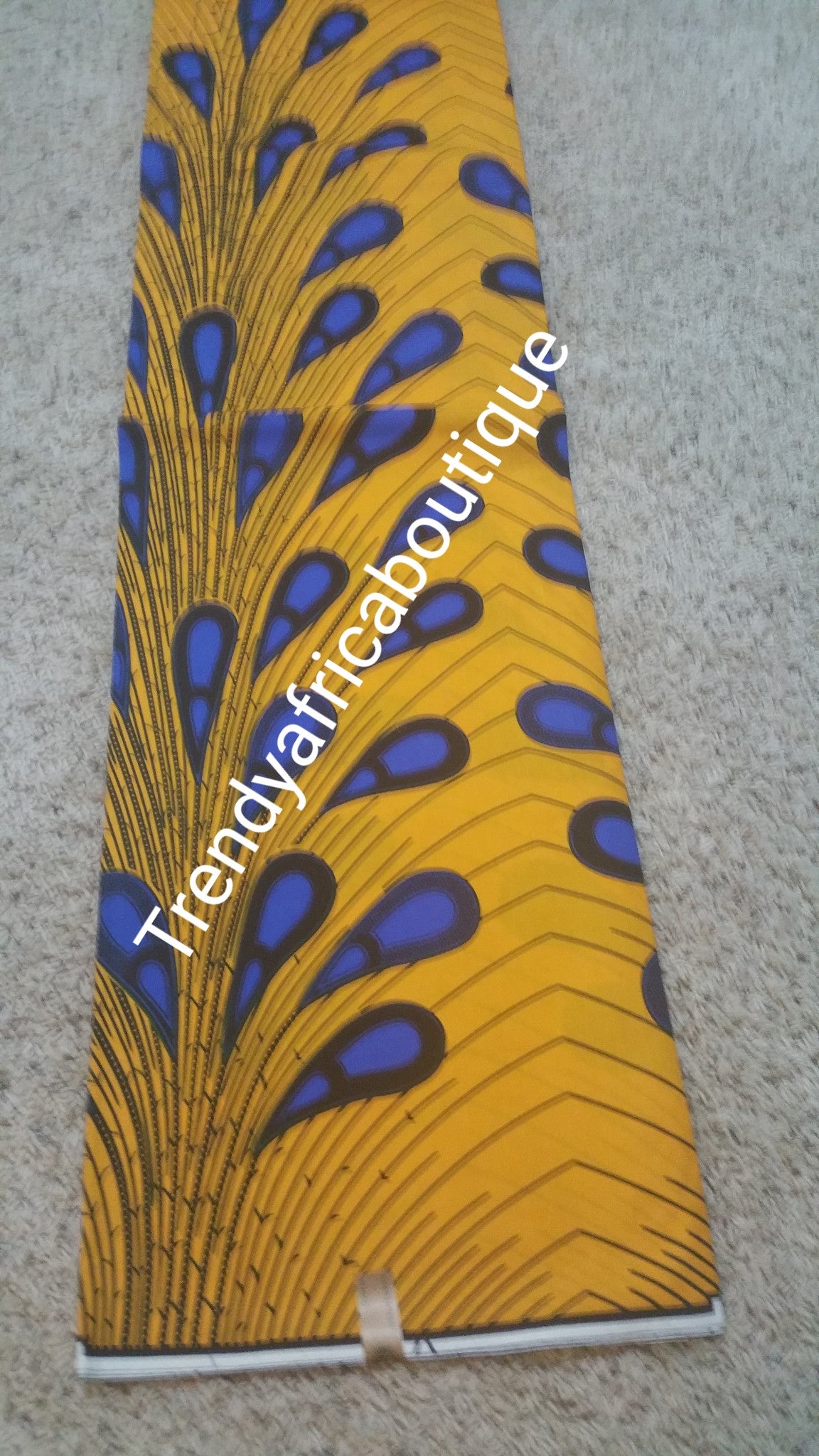 Yellow/blue electric bulbs African cotton wax print fabrics. 100% cotton. Sold per 6yds.