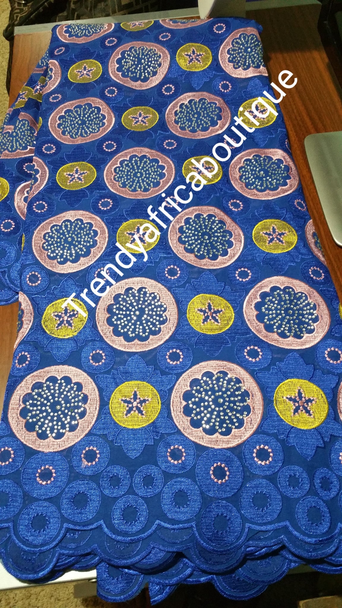 Turquoise/peach/yellow exclusive Grand Swiss lace fabric. All over crystal stones design