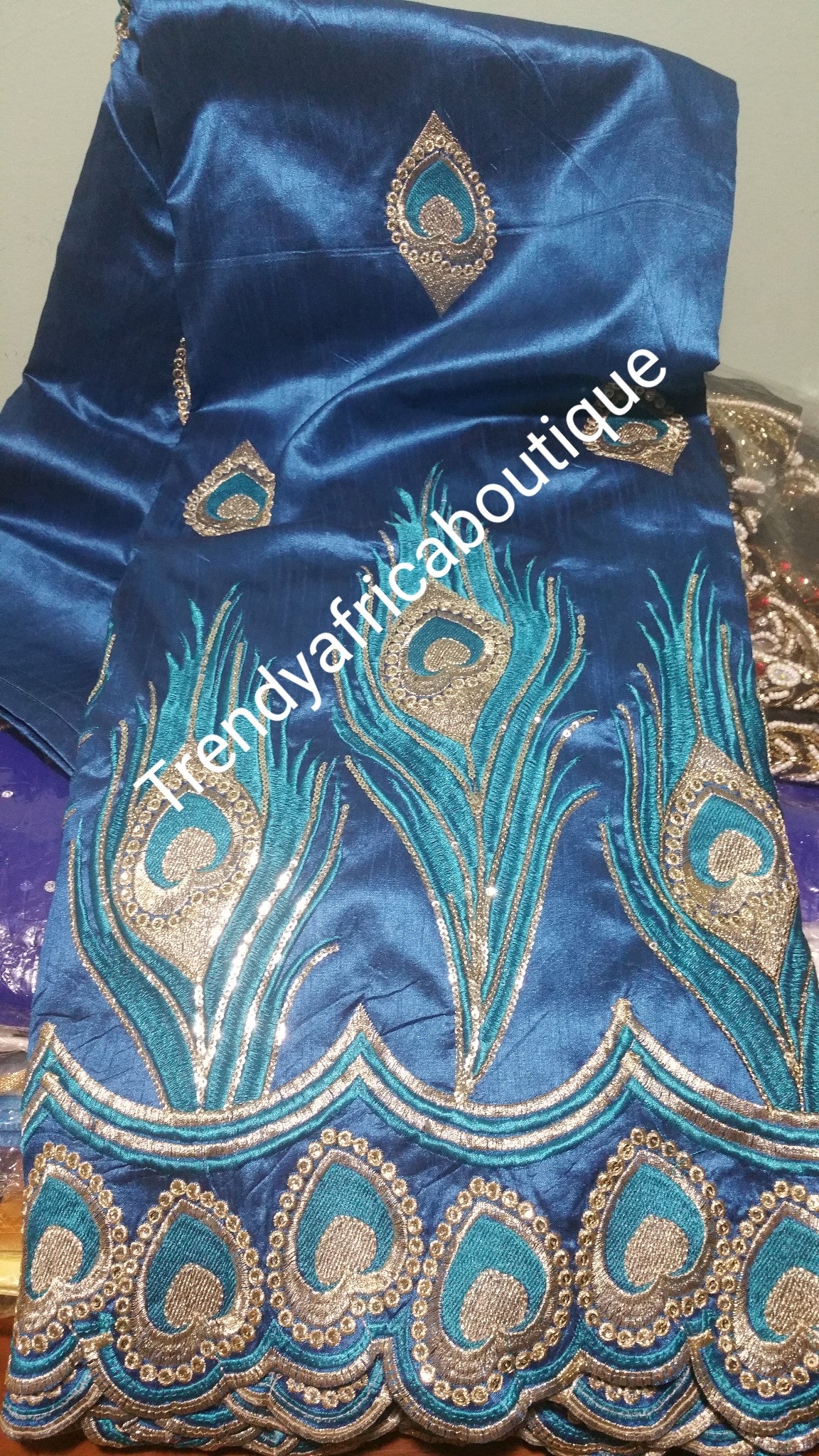 Turquoise blue/gold Embroidery Indian fancy silk George wrapper. Sold as 5yrds lenght. Price is for 5yds. Original silk quality. Small-George