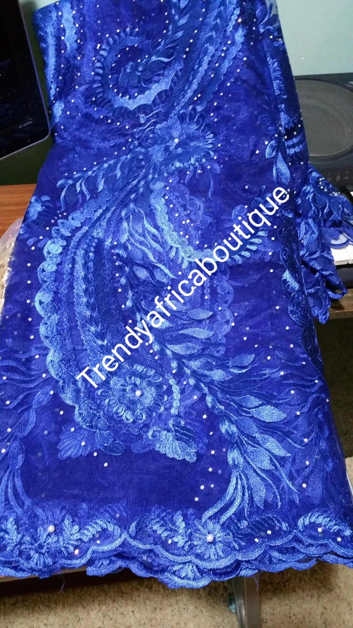 African french lace fabric in Royal blue. All over crystal stones. Nigerian lace fabric for making party dresses. Sold per 5yds.