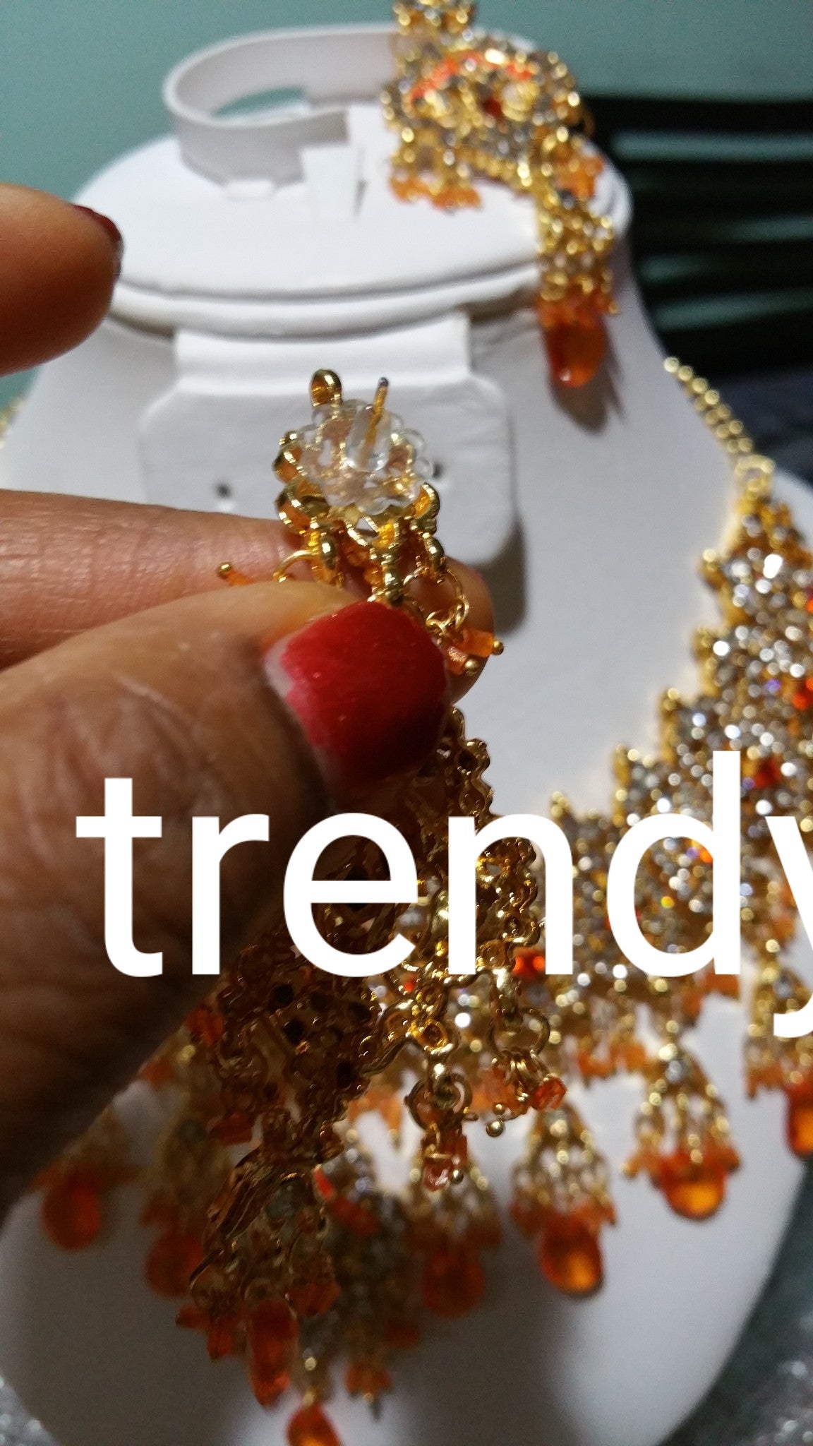 22k Gold plated jewelry set with orange beads accent. 2pcs set