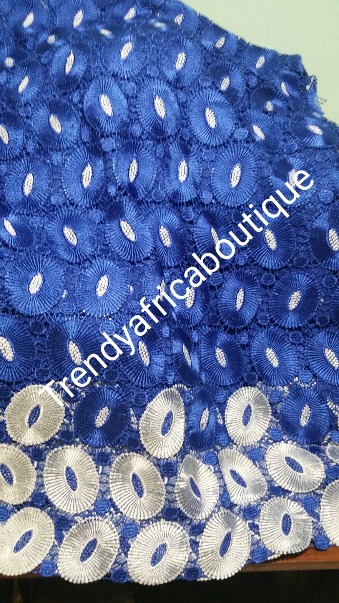Royalblue/white cord-lace fabric. Quality guipure lace fabric. Superior quality African Swiss lace. Soft texture. Sold per 5yds lenght