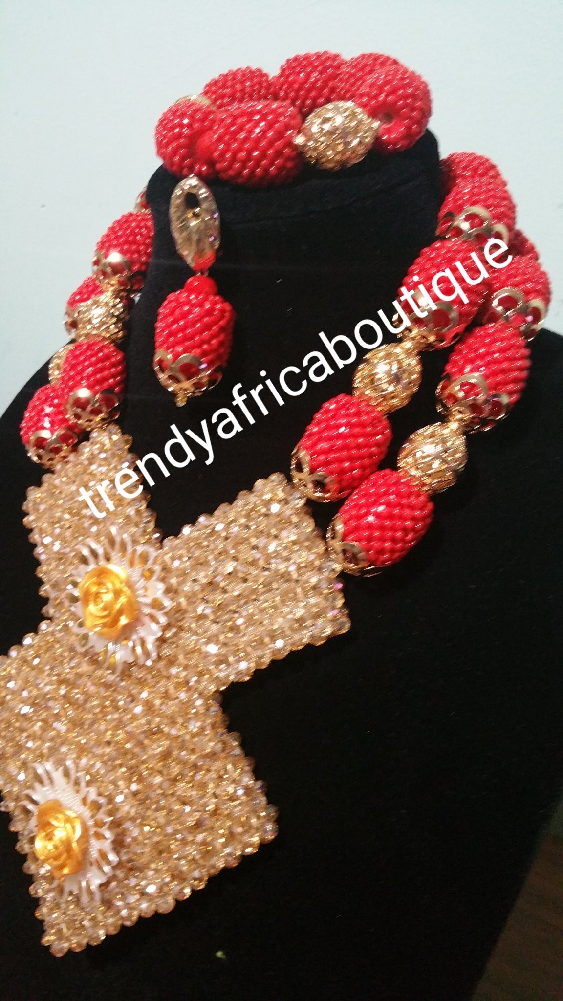 Beautiful hand made coral beaded-necklace set for Nigerian weddings/Ceremonies. Coral beaded necklace set with bracelet and earrings. Tomato red/ gold. Sold as a set