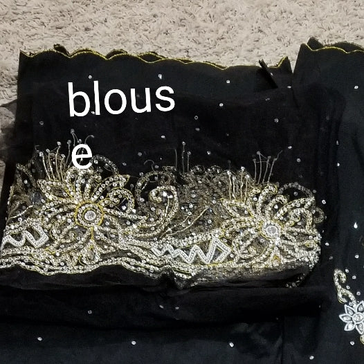 1st lady Igbo Traditional wedding hand stoned Silk George wrapper. Black Big madam celebrant 2.5yds + 2.5yds wrapper + matching blouse as shown on model