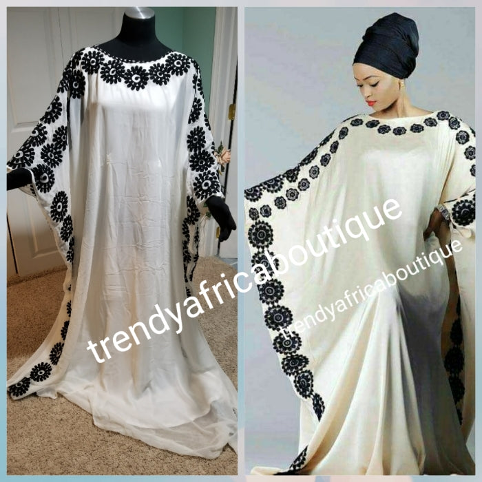 One size fit Dubai dressy kaftan. Free flowing bubu in Gorgeous White Trendy Africa Boutique