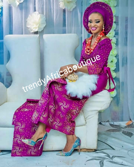 5pcs custom-made aso-oke set for Bride/celebrant. Beaddazzled with rhinstones and beads. Made-to-order Fuschia pink latest aso-oke design with feather hand fan combo. Allow 6-8 weeks for delivery.