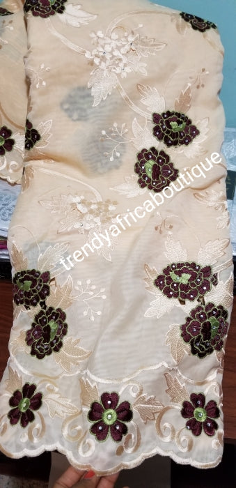 Classic Double Organza African Lace fabric. Wine/green Embriodery work on Beige fabric. Sold per 5yds. This is a Clearance item. Best price for a quality fabric