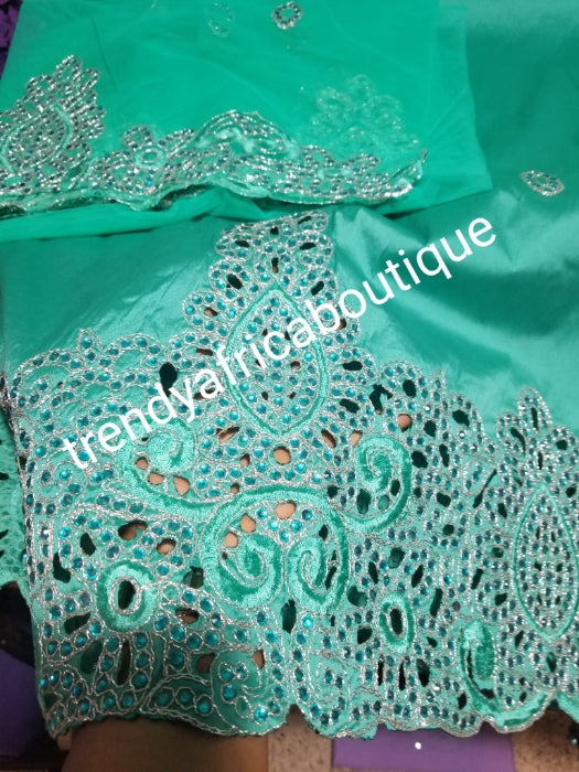 Back in stock: Mint green embriodery George fabric. Top quality Indian-George for making Nigerian/African party dress. 5yds silk George + 1.8yds matching net blouse. Contact us if you are interested in Aso-ebi order