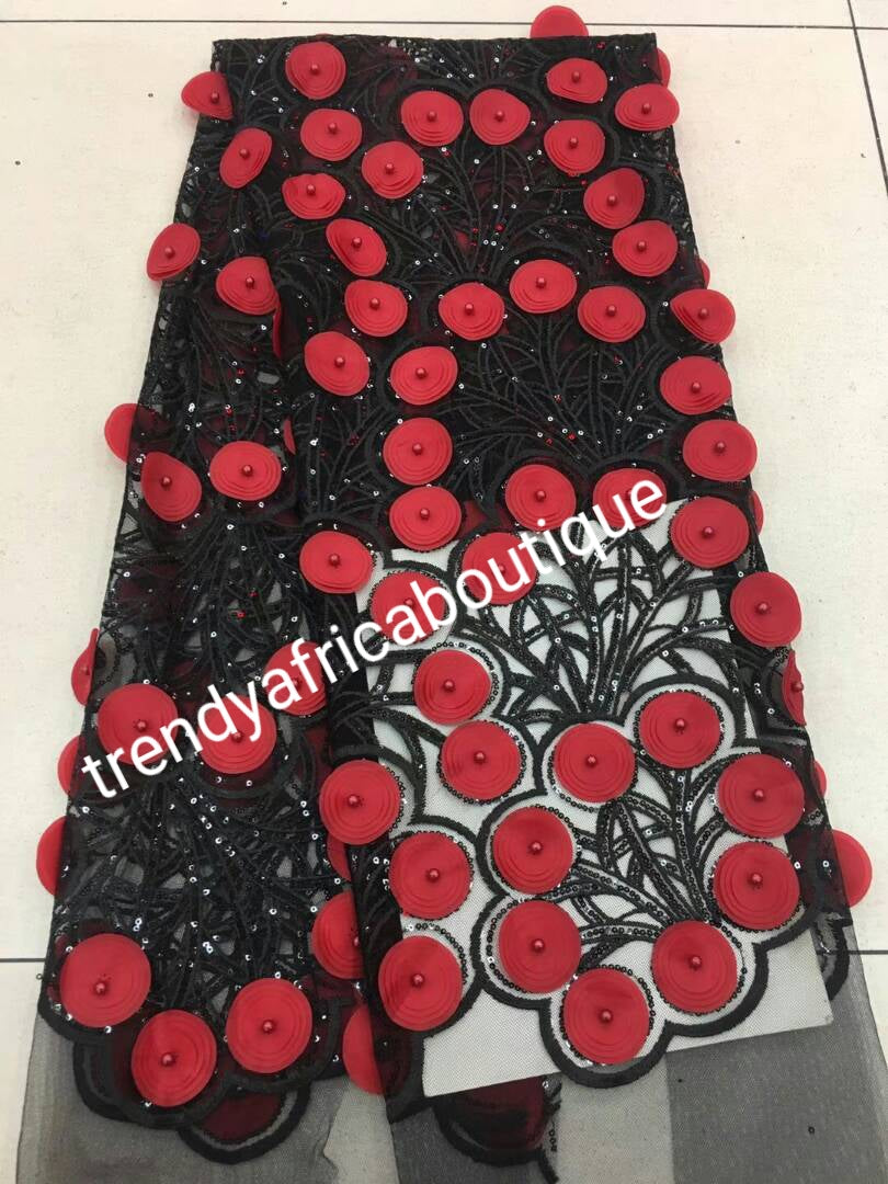Latest French lace. Black embellished with red petals. Exclusive handcut design with petals. Sold per 5yds. Nigerian/African wedding french lace fabric
