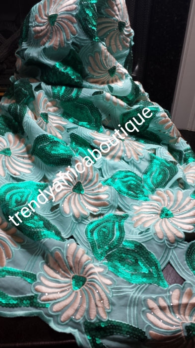 Sale: Top quality swiss lace fabric in Mint green/peach. Swiss voile with beautiful sequence design/ peach embroidery. Nigerian Party lace for high society party. Sold per 5yds with free matching peach headtie. Original swiss made fabric