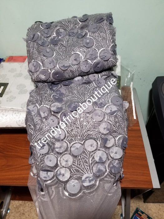 Latest French lace design. Gray handcut sequence Celebrant French lace fabric. Embellish with all over petals to perfection. Sold per 5yds. Celebrant/bridal lace fabric
