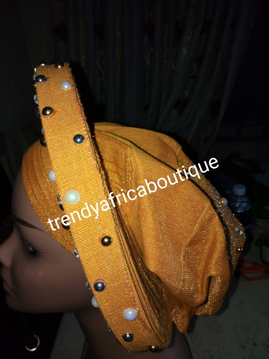 Gold Auto-gele made with quality Aso-oke. Beaded and stoned quality hand work. One size fit, easy to adjust for fit and knot at the back