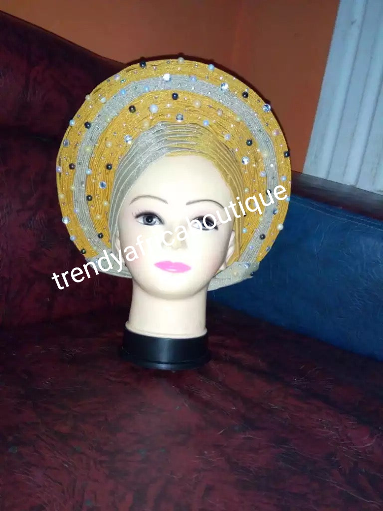 Champagne/Gold. Latest Nigerian  Auto-gele made with quality Aso-oke. Beaded and stoned quality hand work. One size fit, easy to adjust for fit and knot at the back. 2 tone color gele accessories