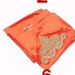 Velvet women-turban embroidered with crystal stone art work on the side for a more creative hair wrap. This is orange color.