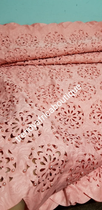 New arrival top quality coral peach Laser cut African French Lace fabric. Beaded and stones to perfection. Full laser cut. Sold per 5yds. Price is for 5yds