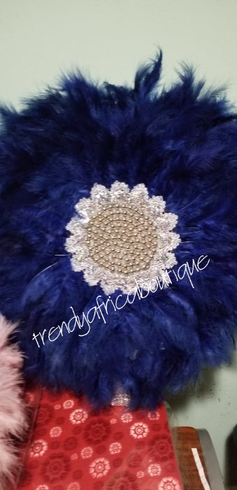 Latest feather hand fan in beautiful dark royal blue. Bridal Accessories hand fan for celebrant. Fully handmade with silver handlel. Nigerian Bride fluffy feathers hand fan