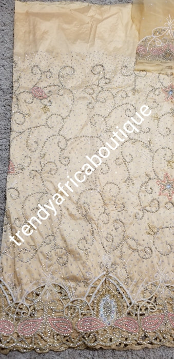 Clearance sale champagne gold VIP George for Nigerian/Igbo/delta Traditional weddings/birthdays and more wrapper + 1.8yds net fabric for making blouse. Sold as. A set of wrapper and blouse. Original quality silk. "Feel the difference in Quality"