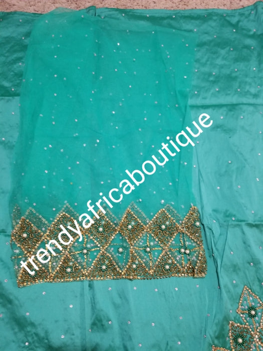 Clearance: quality Celebrants Sweet Green with all over Hand stoned silk George wrapper for Nigerian party outfit. Sold per set of 2.5yds + 2.5yds+1.8yds net for making a blouse. Nigerian, Delta/Igbo/Edo weddings