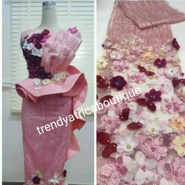 New arrival french lace fabric. Beautiful 3D flower border made to perfection. Ideal for evening gown, or Nigerian traditional wedding outfit. This color is lilac with purple multi color petals. Sold per 5yds