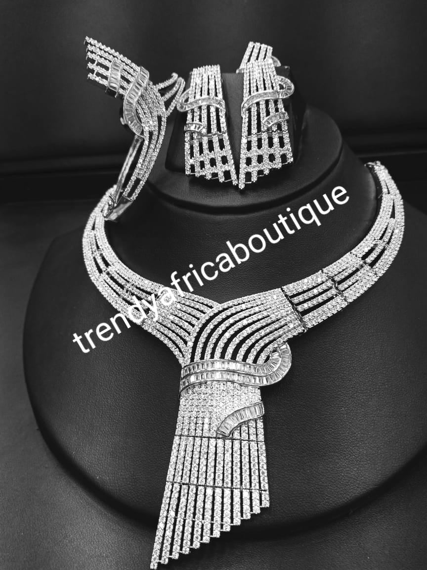 New arrival Celebrants 4pcs matching set of 22k Silver Electroplated high quality CZ diamond shinning stones. Quality stone setting, hypoallergenic. Necklace, earrings, ring and bangle set. Quality set