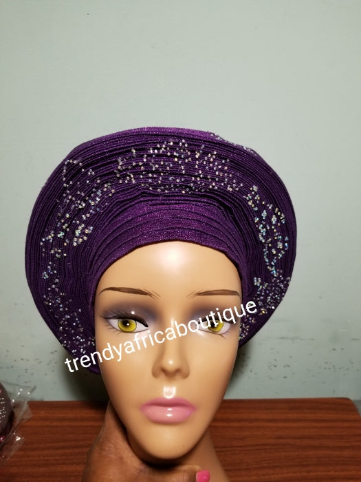 Beautiful Purple Auto-gele made with quality Aso-oke. Silver stoned work to perfection. One size fit, easy to adjust for fit and knot at the back to secure your gele. This is true original auto gele