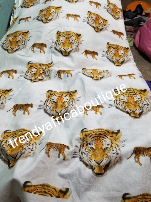 Sale; Original quality white/Gold Isi-agu wrapper, Igbo traditional wrapper use by men or women. Sold per yard, price is for one yard. Nigerian/igbo ceremonia fabric. Soft texture, authentic isi-agu fabric. Igbo Tiger head fabric.