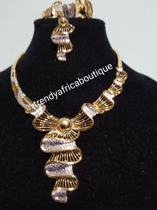 Beautiful Dubai costume jewelry set in 18k two tone gold plating. High quality hypoallergenic jewelry set. 4pcs set. Sold per set..
