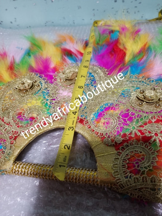Latest multi color, Nigerian hand made Feather hand fan. Custom made, front/back design beaded and stoned. Large hand fan Nigerian Bridal-accessories design with beads and flower petal. Measure 24" long× 13" wide