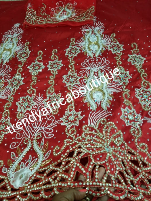 Ready to ship: Exclusive tomato Red Madam/celebrant Nigerian George wrapper. Beaded and stoned with hand cut border. Special occasion wrapper. 5yds + 1.8yds matching net (now sewn) for blouse. Tradtional Igbo/Delta Bridal outfit